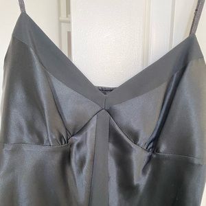 Spaghetti strap blouse with detailing.